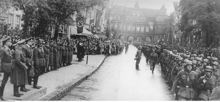 German folk band sings songs of Wehrmacht in a city where WWII began
