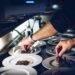 person preparing cooked dish