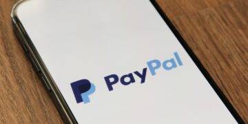 a phone with a pay pay logo on it