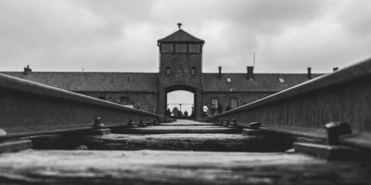 grayscale photo of concrete bridge