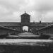 grayscale photo of concrete bridge