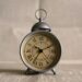 turned on gray alarm clock displaying 10:11