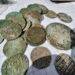 Treasure Trove of 400-Year-Old Coins Unearthed in Western Poland