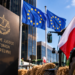 Polish flag and tractor outside the Court of Justice of the European Union