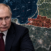 Editorial image of Vladimir Putin with a strategic map of Kaliningrad, Poland and Lithuania