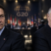 Radosław Sikorski and Vladimir Putin in a split-frame editorial image with a blurred G20 conference backdrop