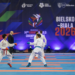 Two karate competitors spar at the 2026 World Cadet, Junior and Under-21 Championships in Bielsko-Biała.