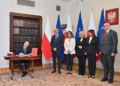 Polish judge-elect takes oath without president but is blocked from hearing cases