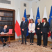 Polish judge-elect takes oath without president but is blocked from hearing cases