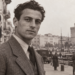 Editorial historical illustration of Jerzy Iwanow-Szajnowicz against a wartime Greek harbour setting