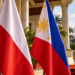 Illustrative image of Polish and Philippine flags in a formal diplomatic setting