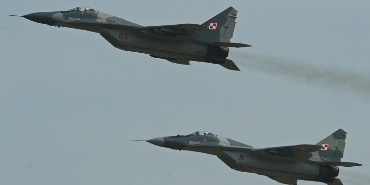 Two Polish Air Force MiG-29 fighters flying in formation at the 2013 Royal International Air Tattoo