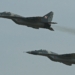 Two Polish Air Force MiG-29 fighters flying in formation at the 2013 Royal International Air Tattoo