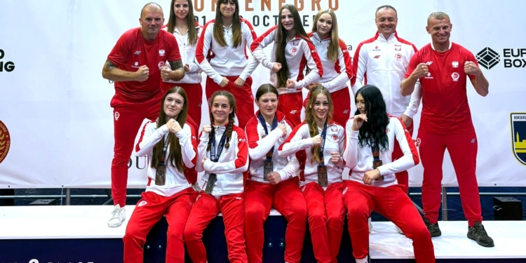 Group of Polish women's U17 boxing competitors and coaches in red-and-white team kit at the European Championships in Budva, Montenegro