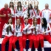 Group of Polish women's U17 boxing competitors and coaches in red-and-white team kit at the European Championships in Budva, Montenegro