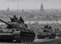 AI-generated editorial illustration of Soviet armoured columns with Warsaw in the background, representing the October 1956 crisis; not an authentic historical photograph