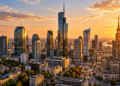 Digitally created Warsaw skyline at sunset, with Varso Tower and the Palace of Culture and Science above the modern financial district.