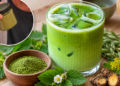Iced green Herbatcha drink with green herbal powder and plant ingredients