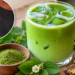 Iced green Herbatcha drink with green herbal powder and plant ingredients