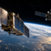 Illustrative image of two satellites over Earth, with their appearance and distance not representing the actual ICEYE-X36 and Cosmos 2612 spacecraft.