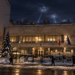 Digitally created night view based on the Polish Embassy in Kyiv, with distant air-defence searchlights over the city