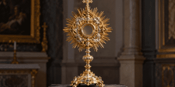 Digitally created illustrative representation of an ornate gilded monstrance in a historic church; not the recovered Moskorzew artefact.
