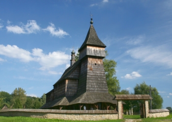 The 17th-century wooden Church of St Nicholas from Bączal Dolny at the Sanok open-air museum, photographed before the August 2026 fire.