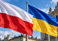Digitally generated editorial illustration of Polish and Ukrainian flags outside a European-style government building.