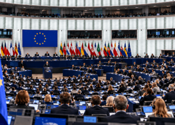 Digitally created editorial illustration of the European Parliament chamber for a story about the Suwałki Gap security discussion