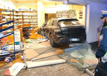 Drunk Porsche driver crashes into open pharmacy in Poland