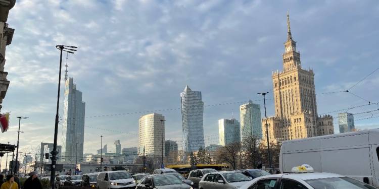 Warsaw skyline showing the Palace of Culture and Science and Varso Tower, photographed in December 2025 by Vikebe (CC0), cropped to 16:9