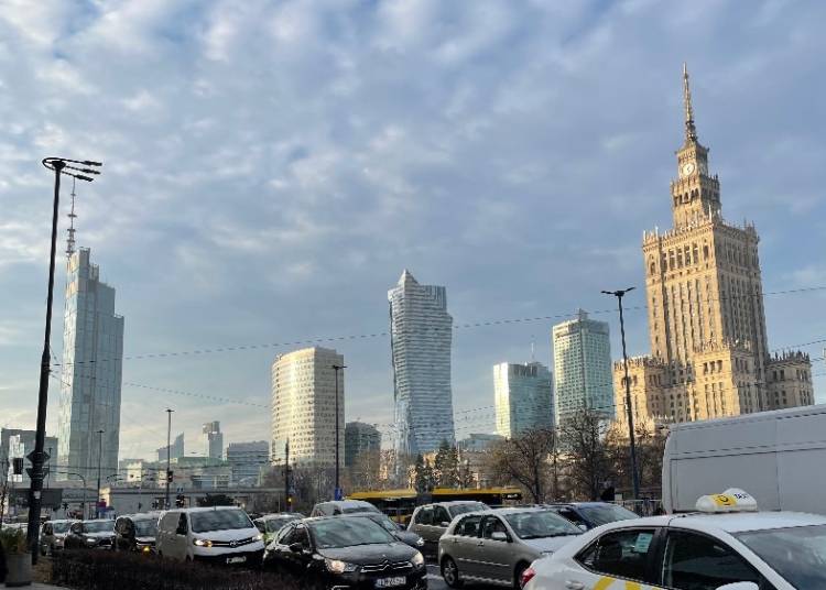 Warsaw skyline showing the Palace of Culture and Science and Varso Tower, photographed in December 2025 by Vikebe (CC0), cropped to 16:9